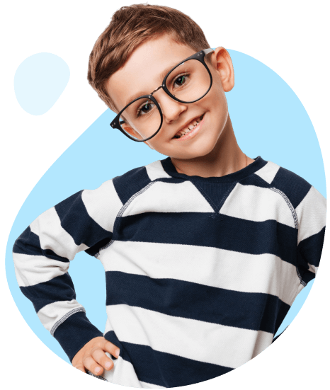 Smiling young boy in striped sweater, representing the joyful learning environment at Las Vegas Christian daycare and STEM academy.