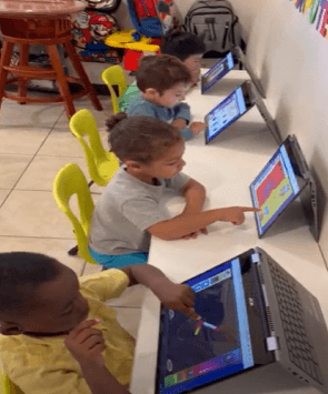 Children aged 2 to 3 engaged in a STEM-focused preschool activity at Learning Space Christian Academy in Las Vegas.